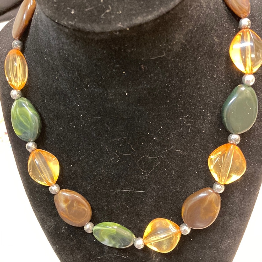 Gold, green and brown bead necklace.